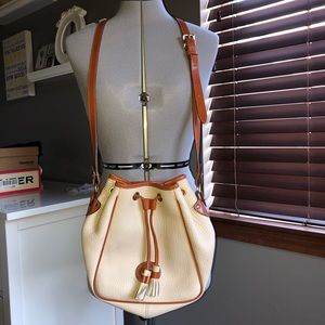 Dooney & Bourke bucket drawstring bag cream EUC